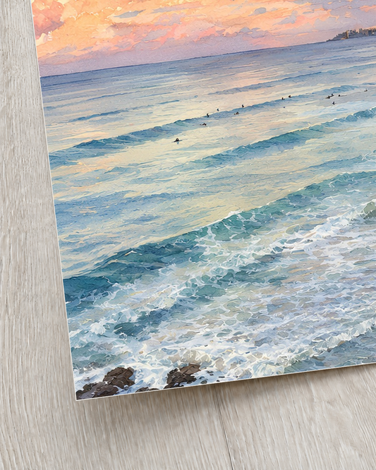 Close-up detail of the Currumbin Beach watercolour print showing peach clouds and blue ocean waves